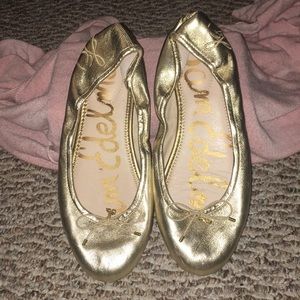 Sam Edelman gold ballerina flats.